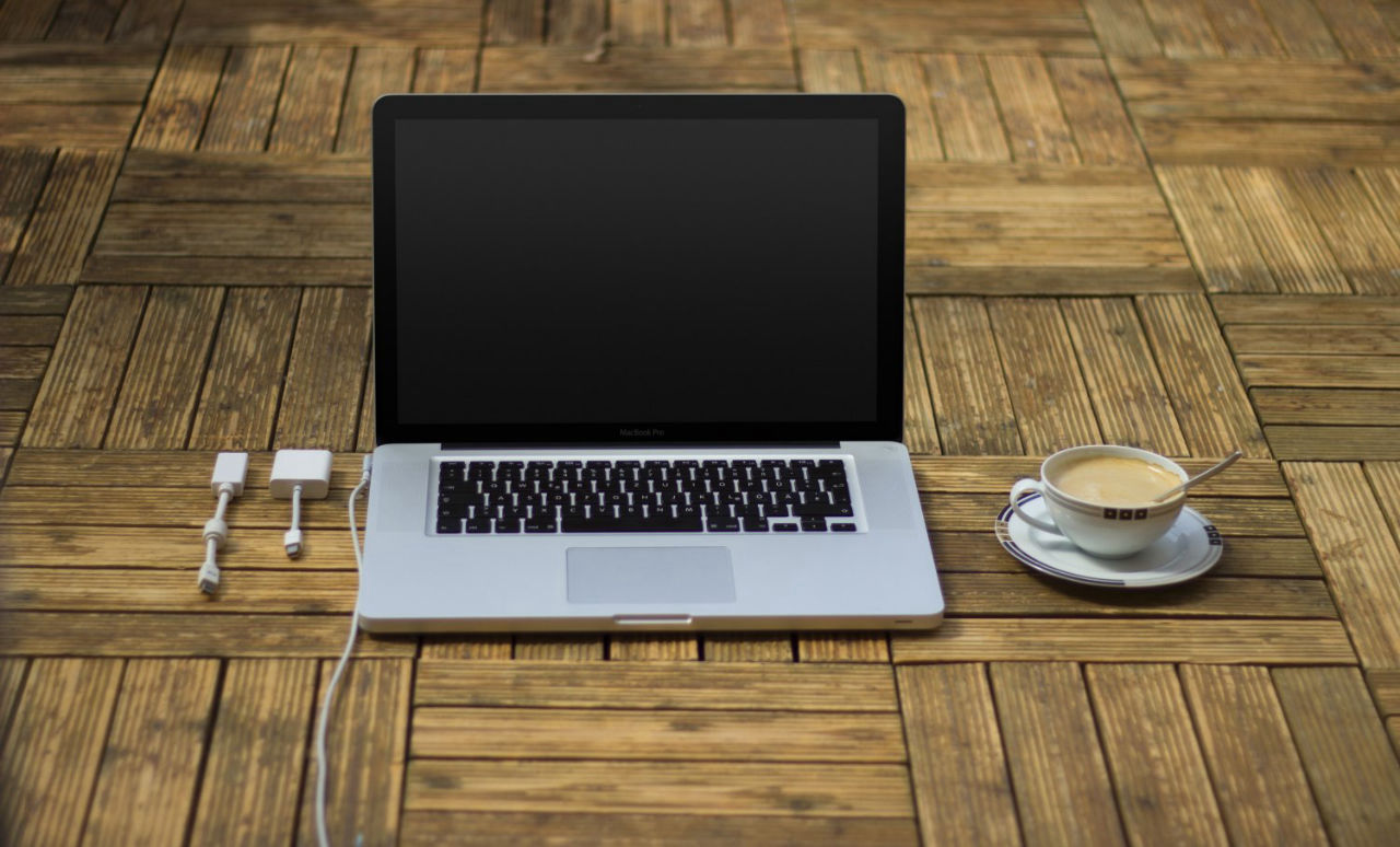MacBook Pro on floor mockup MockupsJar