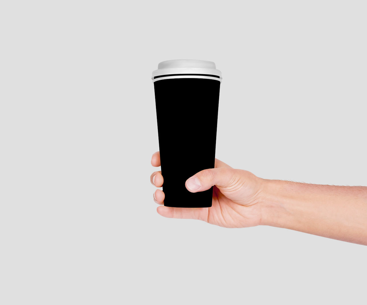 Paper Cup In Hand mockup | MockupsJar
